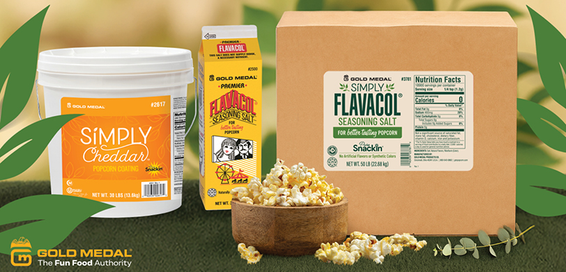 Gold Medal Simply Flavacol and Simply Cheddar packaging with popcorn Gold Medal Simply Flavacol and Simply Cheddar packaging with popcorn